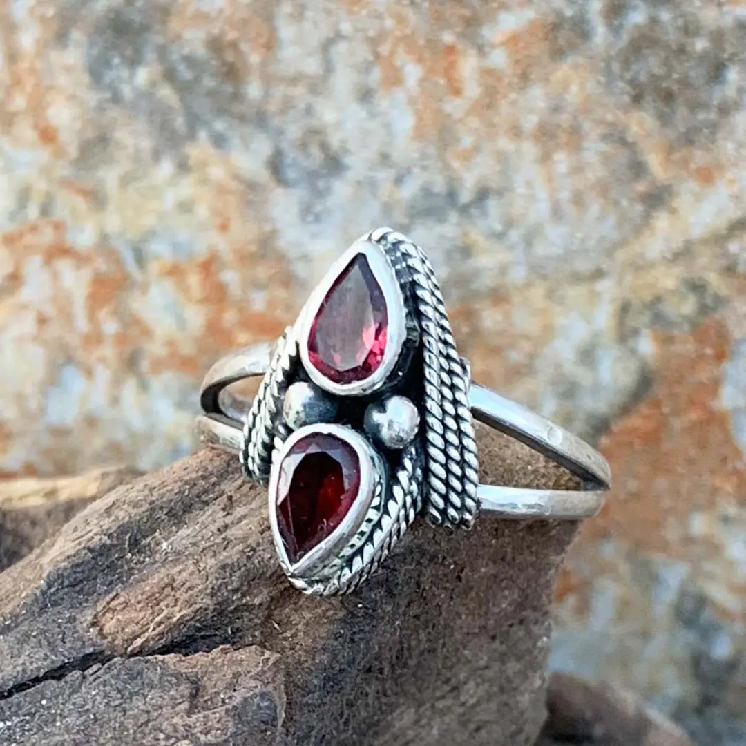 an image of a double teardrop faceted Garnet and Sterling Silver Ring