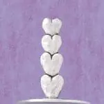 Upright ring holder with stacked hearts