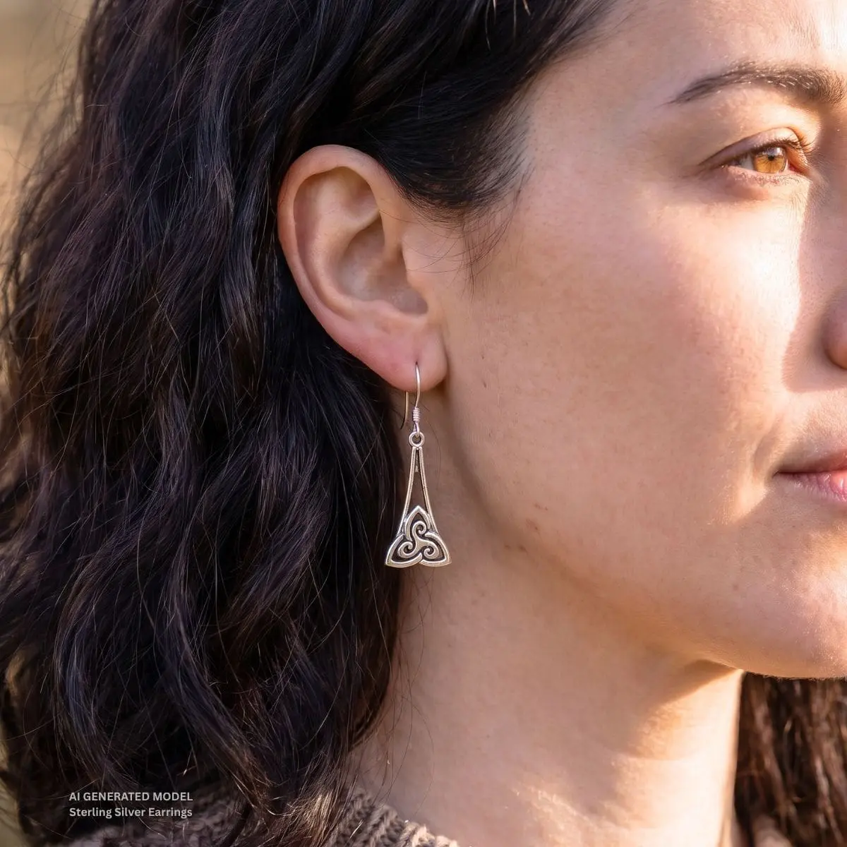 an image of a pair of Triskelion and Triquetra Sterling Earrings with a Triskele symbol sitting inside a Triquetra symbol on an AI generated Model