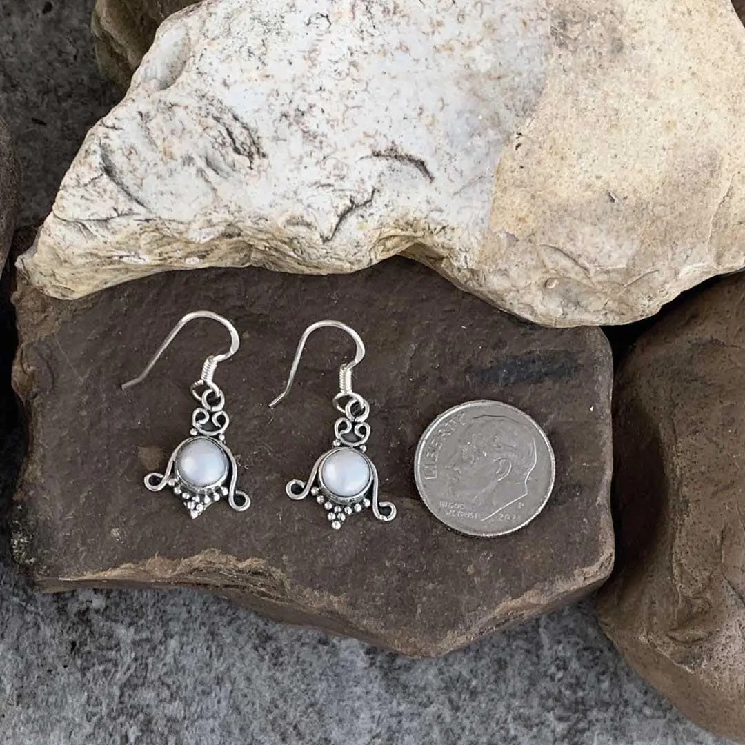 Dainty Dangly Pearl Earrings - Image 2