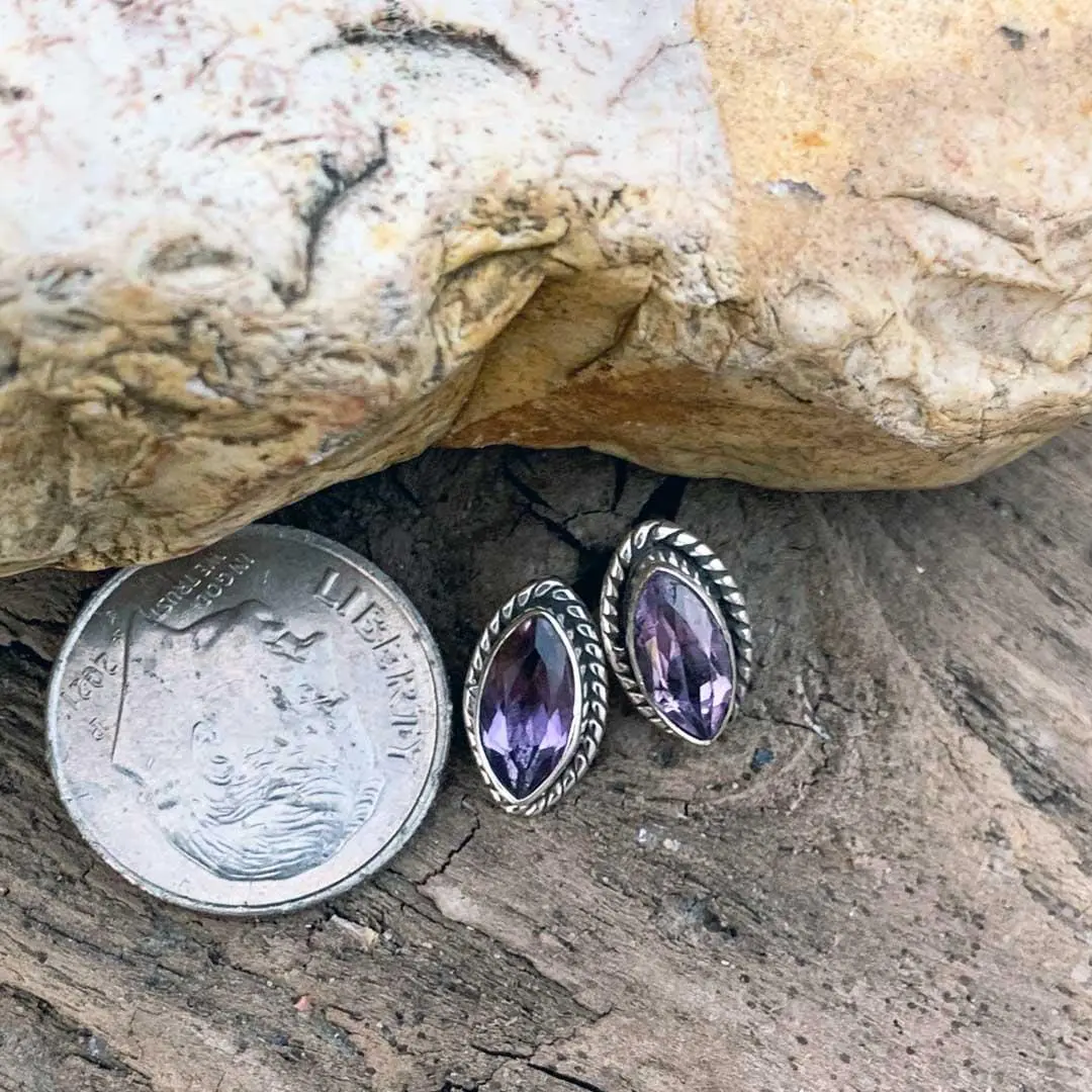 an image of a pair of Marquise Amethyst and Sterling Silver Stud Earrings next to a dime