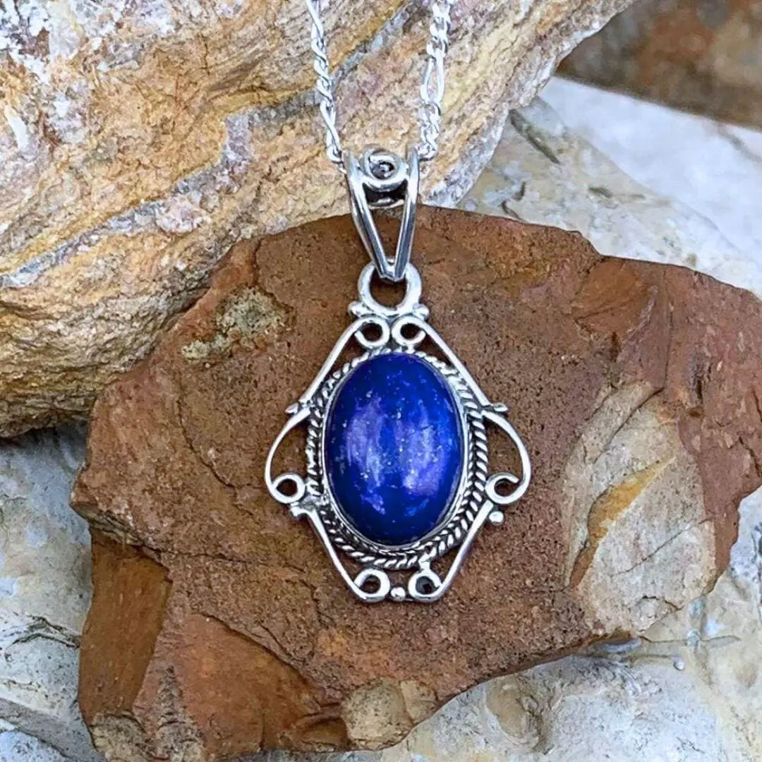Photo of Sterling Silver Filigree surrounding an Oval Shaped Lapis Lazuli Pendant
