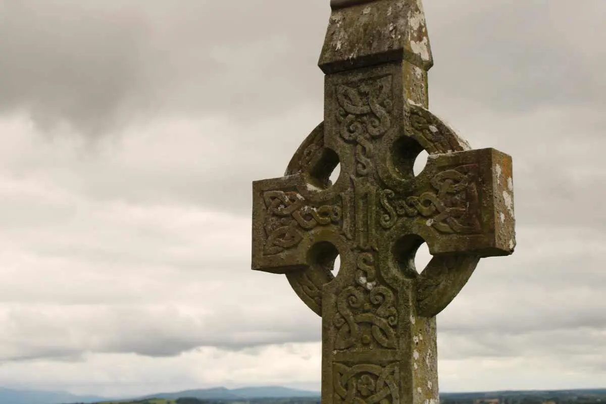 An image of an old stone Celtic Cross