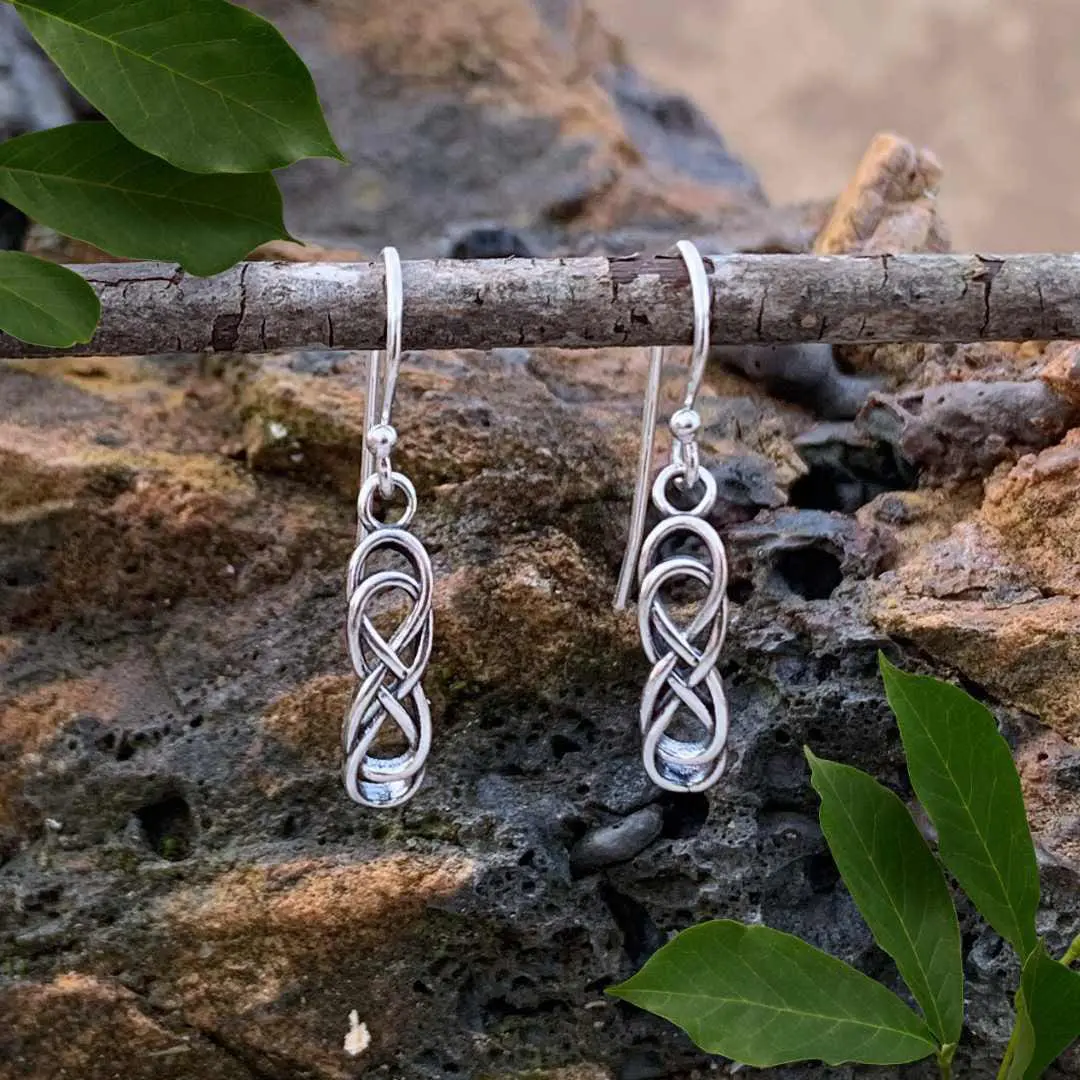 an image of a dainty pair of Sterling Silver Double Infinity Celtic Knot Dangle Earrings that are .566 inches in height.