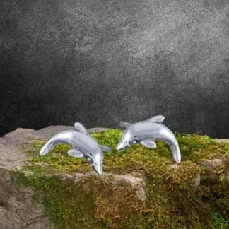 an image of a pair of Sterling Silver Dolphin Stud earrings with the dolphins arching as if jumping out of the water.