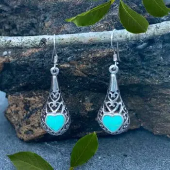 pair of sterling silver filigree earrings with a Turquoise heart on each earrings