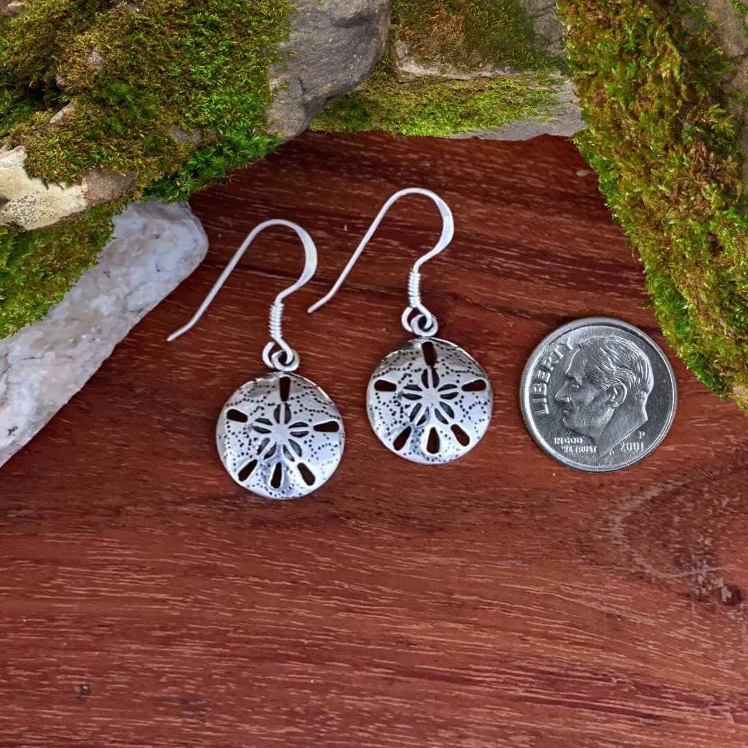 an image of a pair of Sterling Silver Dangle Sand Dollar Earrings next to a dime