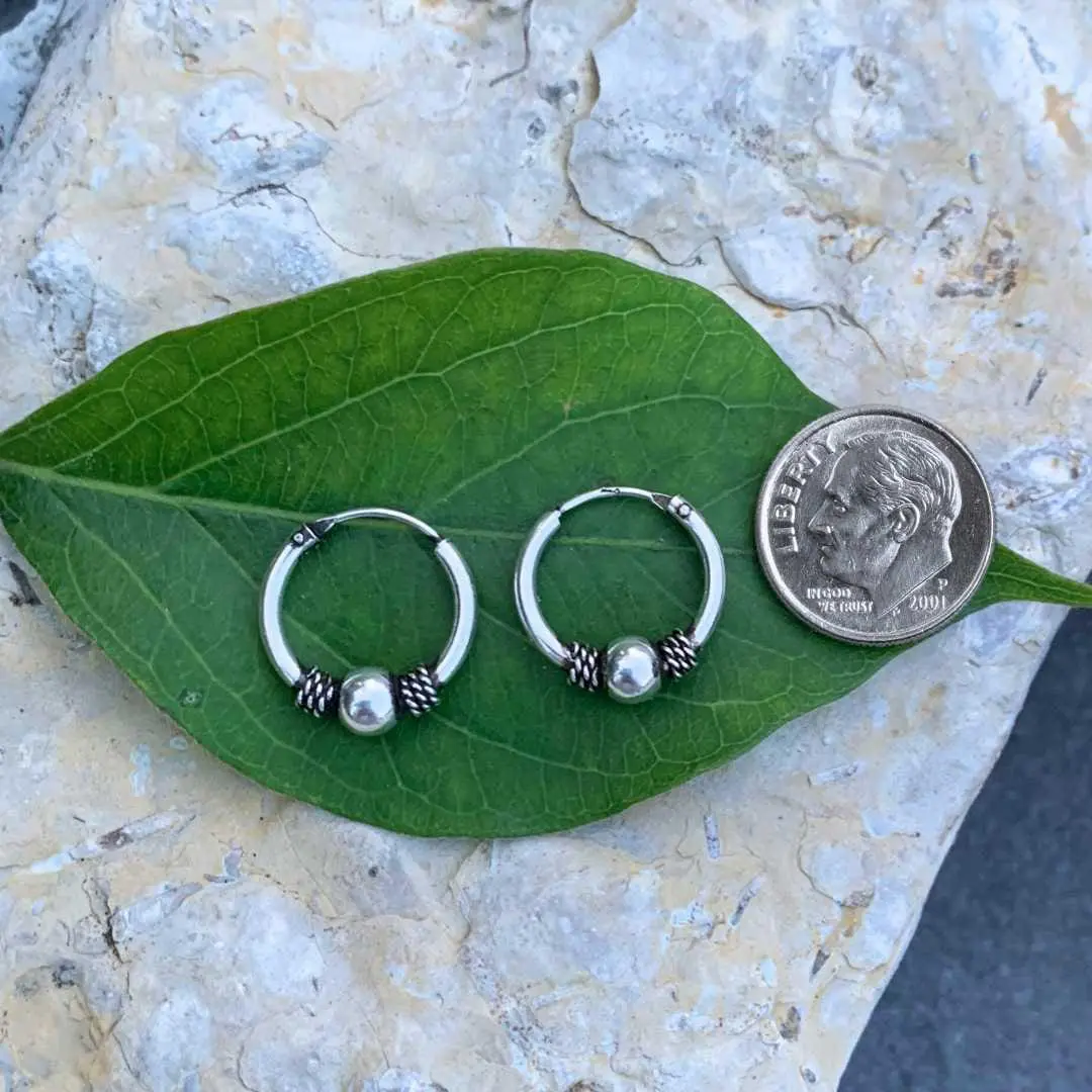 an image of a Small Sterling Silver Ball Bali Hoop Earrings next to a dime