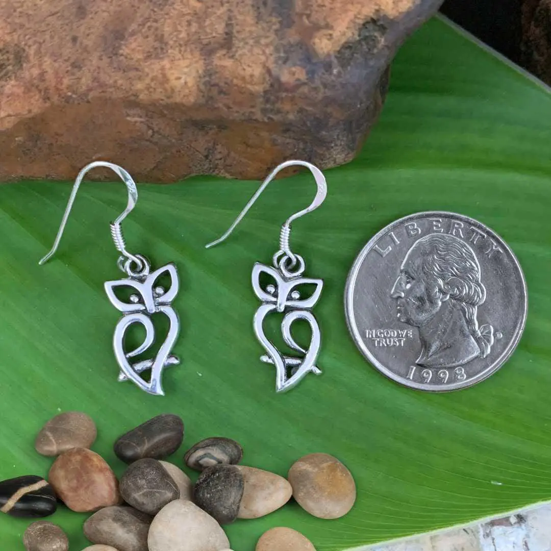 an image of an open silhouette style of owl dangle earrings