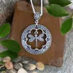 an image of a Vintage Style Sterling Silver Dragonfly Pendant with a circle and a dragonfly hanging in the center