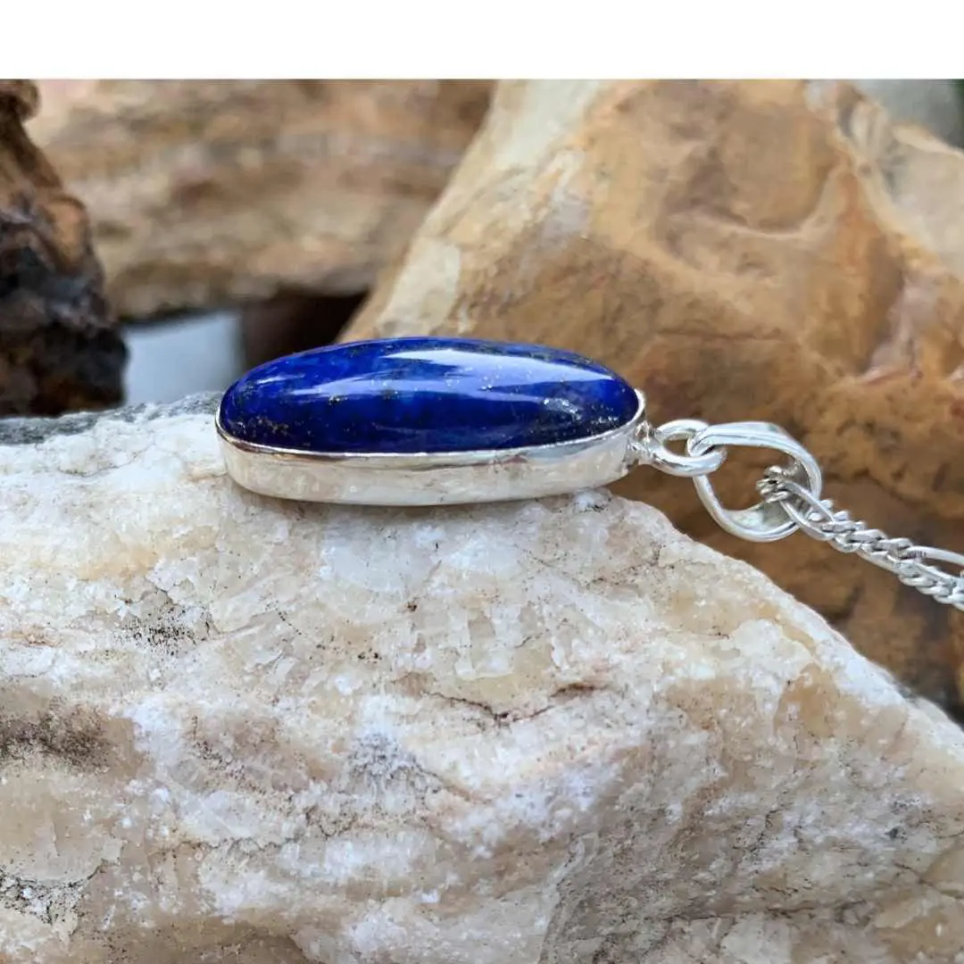 an image of a side view of an Oblong Lapis Lazuli and Sterling Silver Pendant