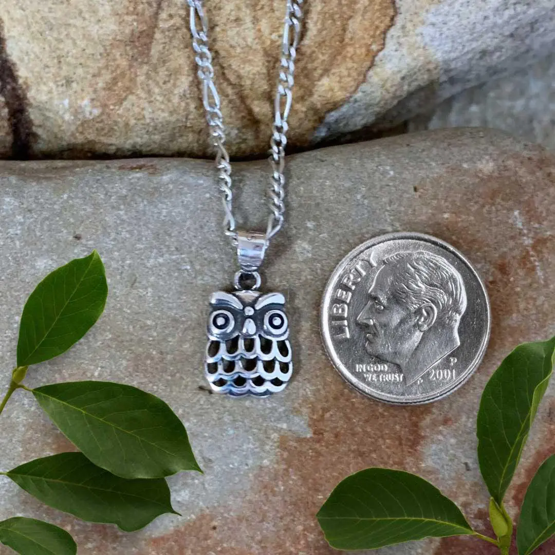 an image of a Petite Sterling Silver Owl Pendant next to a dime
