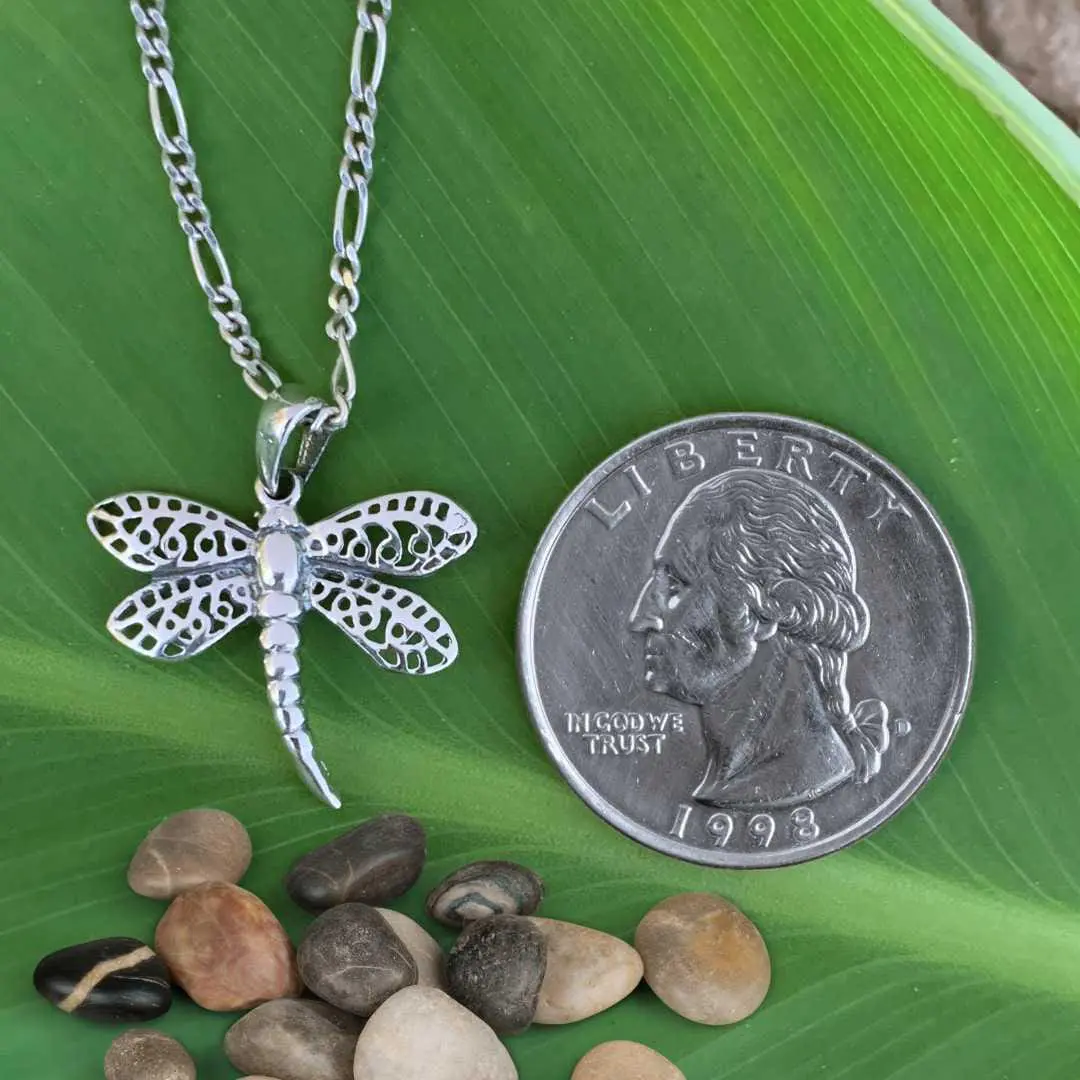 an image of a Airy Sterling Silver Dragonfly Pendant next to a quarter