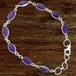 an image of a Amethyst Marquise Sterling Silver Bracelet featuring 9 marquise shaped amethyst gemstones all set in sterling silver with a sterling silver lobster clasp