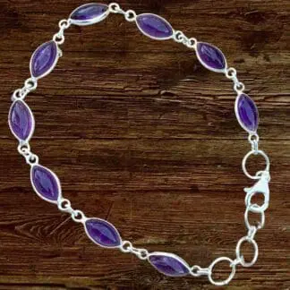 an image of a Amethyst Marquise Sterling Silver Bracelet featuring 9 marquise shaped amethyst gemstones all set in sterling silver with a sterling silver lobster clasp