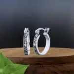 an image of a pair of Petite Diamonds and Dots Sterling Silver Click Hoop Earrings