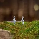 an image of a pair of small Sterling Silver Treble Clef Stud Earrings