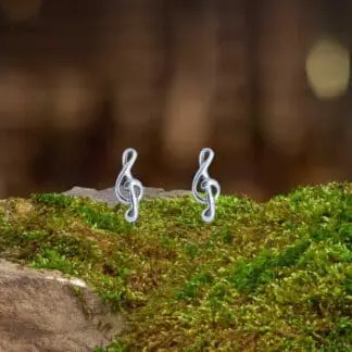 an image of a pair of small Sterling Silver Treble Clef Stud Earrings