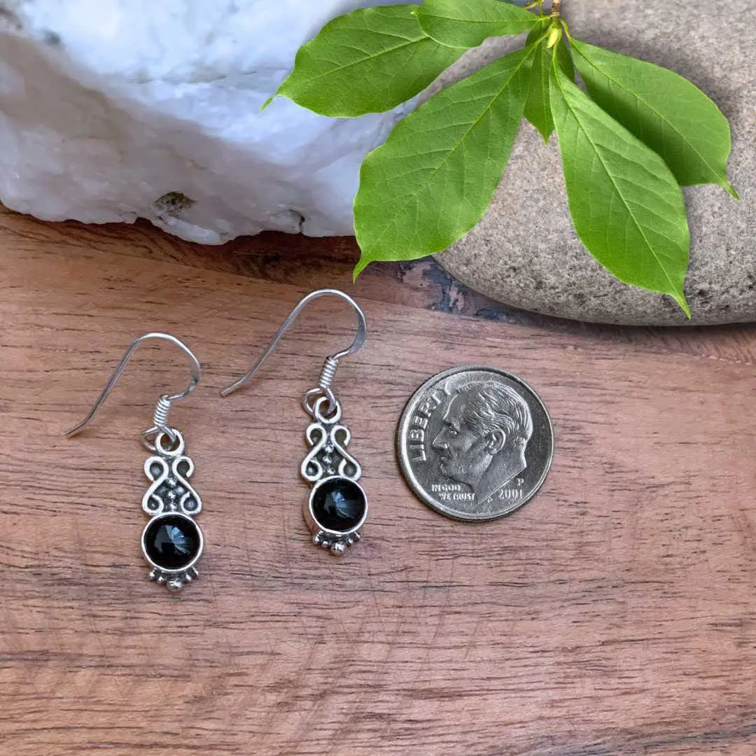 an image of a Dainty Round Black Onyx and Sterling Silver Earrings next to a dime