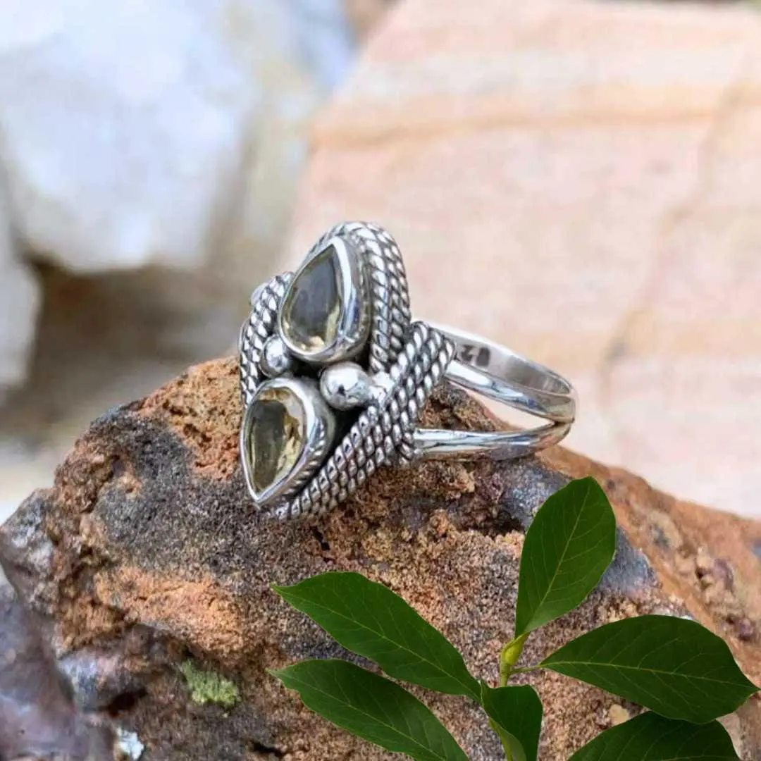a side view image of a Double Faceted Citrine and Sterling Silver Ring