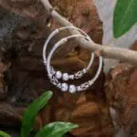 an image of a pair of Sterling Silver Bali Double Ball Hoop Earrings