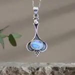 an image of an Oval Rainbow Moonstone and Sterling Silver Beaded Pendant