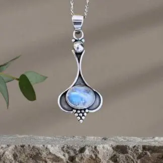 an image of an Oval Rainbow Moonstone and Sterling Silver Beaded Pendant
