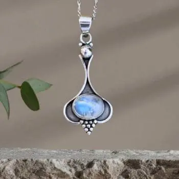 an image of an Oval Rainbow Moonstone and Sterling Silver Beaded Pendant
