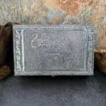 an image of a rectangular shaped hammered tin box with an elephant on the front