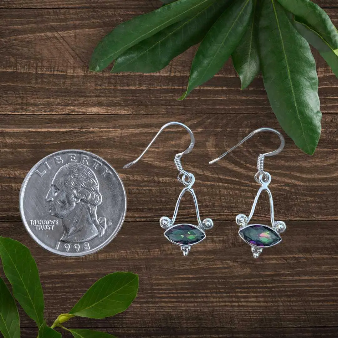 an image of a Marquise Mystic Topaz and Sterling Silver Earrings next to a quarter