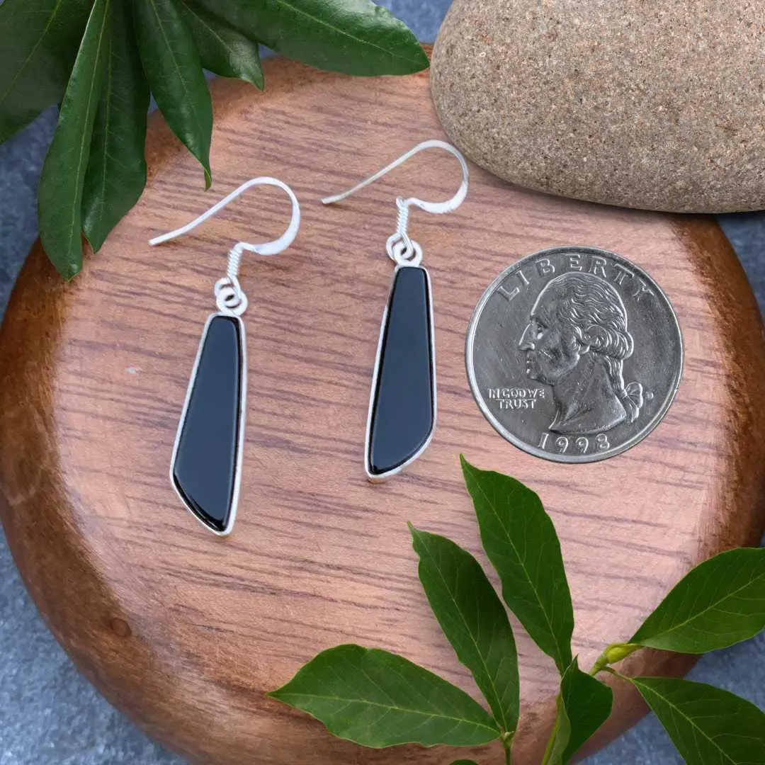 an image of a pair of Contemporary Black Onyx and Sterling Silver Earrings next to a quarter