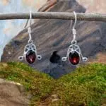 an image of a pair of Oval Faceted Garnet and Sterling Silver Earrings