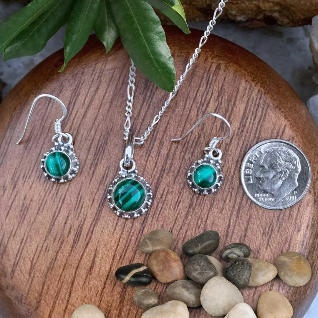 an image of a Dainty Sterling Silver and Malachite Pendant and Earrings Set next to a dime