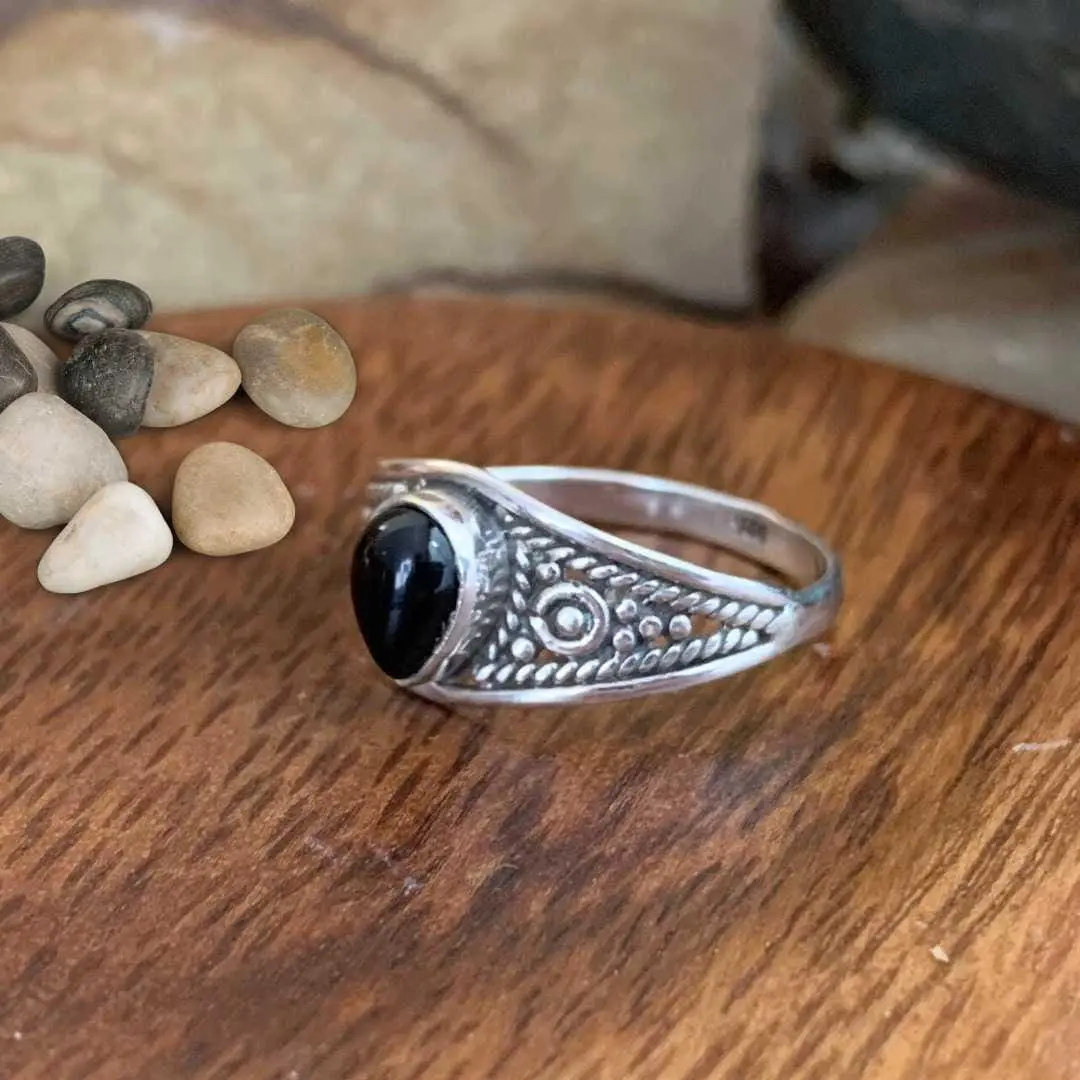 an image of a side view of a Teardrop Black Onyx and Sterling Silver Ring
