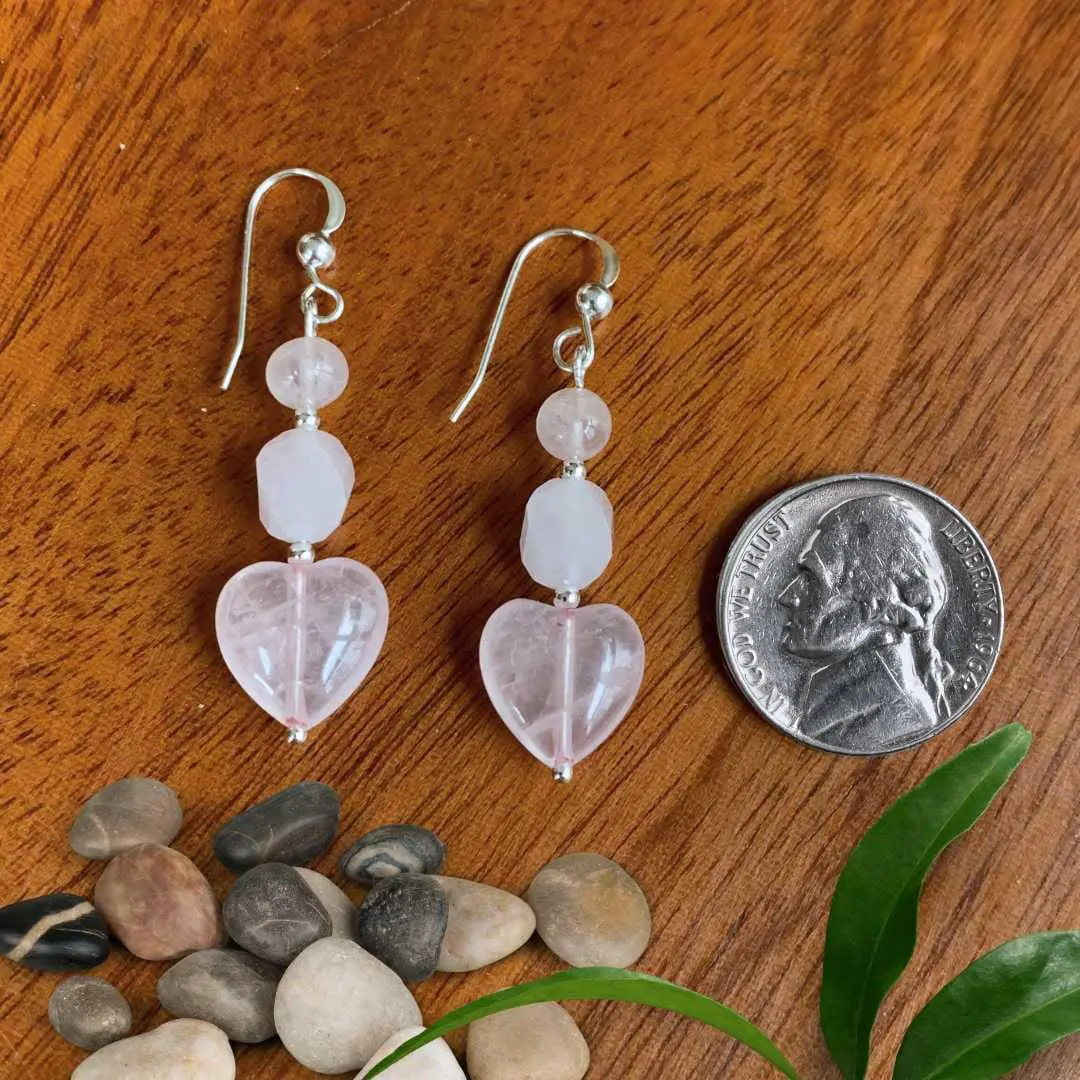 an image of a pair of Rose Quartz Beaded Heart Earrings next to a nickel