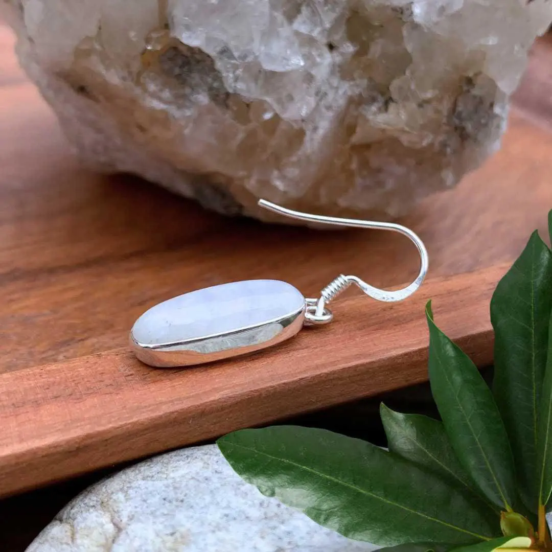 an image of a side view of an Oblong Rainbow Moonstone and Sterling Silver Earring