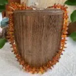 an image of an Amber Chips and Beads Necklace with sterling silver lobster clasp and beads at closure