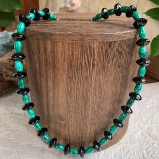 an image of a Malachite and Black Onyx Beaded Necklace featuring alternating 6mm malachite barrel beads and black onyx saucer beads