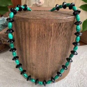 an image of a Malachite and Black Onyx Beaded Necklace featuring alternating 6mm malachite barrel beads and black onyx saucer beads