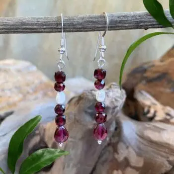 an image of a pair of Faceted Garnets and Pearl Earrings