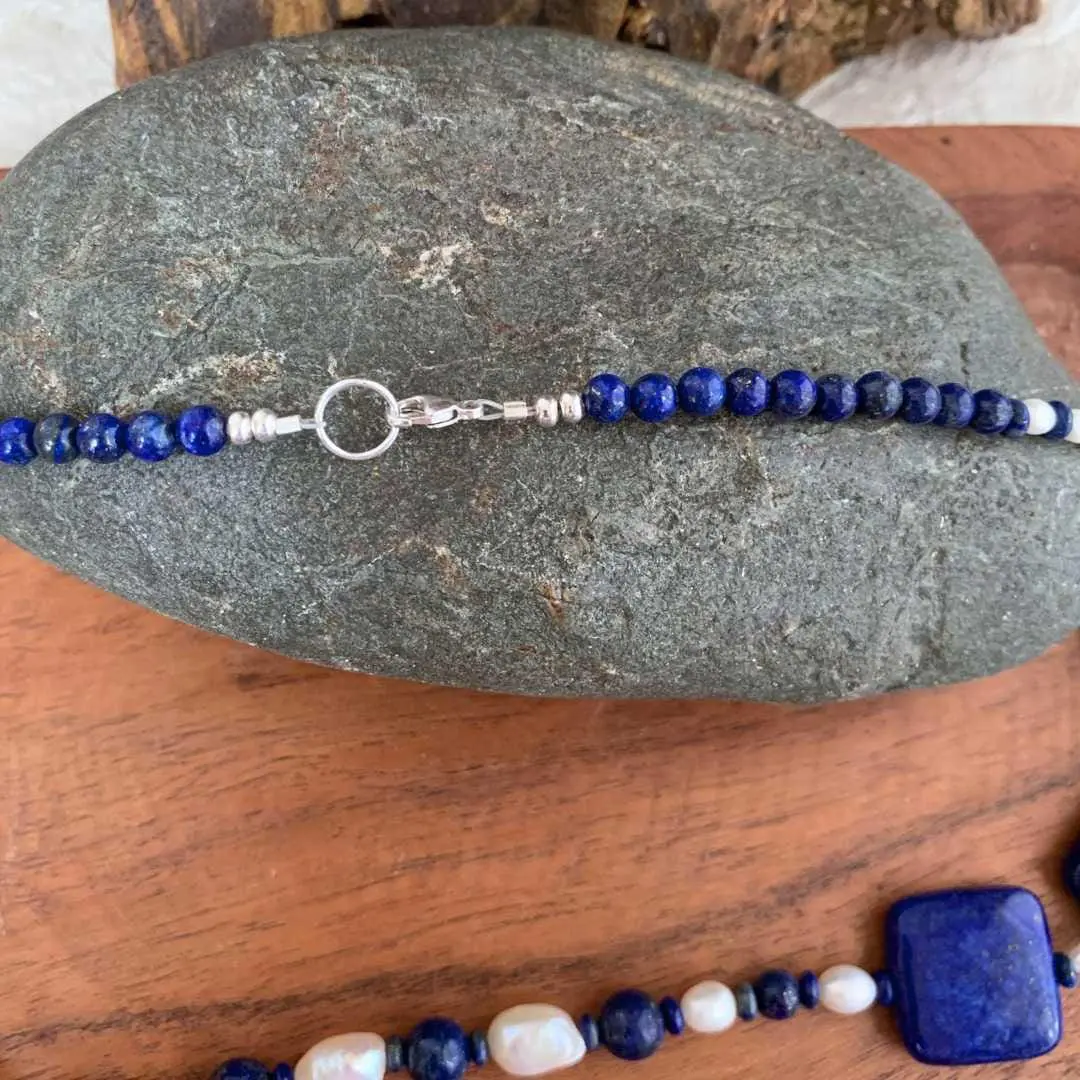 an image of a Lapis Lazuli and Pearls Statement Necklace showing the sterling silver clasp