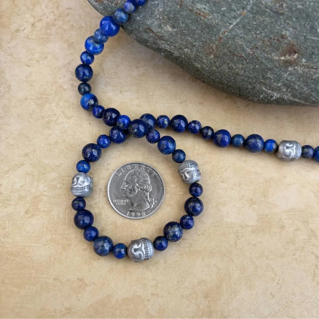 an image of a Hematite Buddhas with Lapis Lazuli Necklace