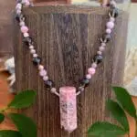 an image of a Rhodochrosite Pendulum and Smoky Quartz Necklace