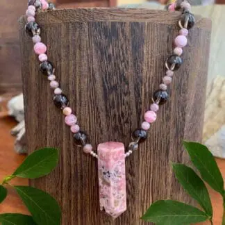 an image of a Rhodochrosite Pendulum and Smoky Quartz Necklace