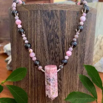 an image of a Rhodochrosite Pendulum and Smoky Quartz Necklace