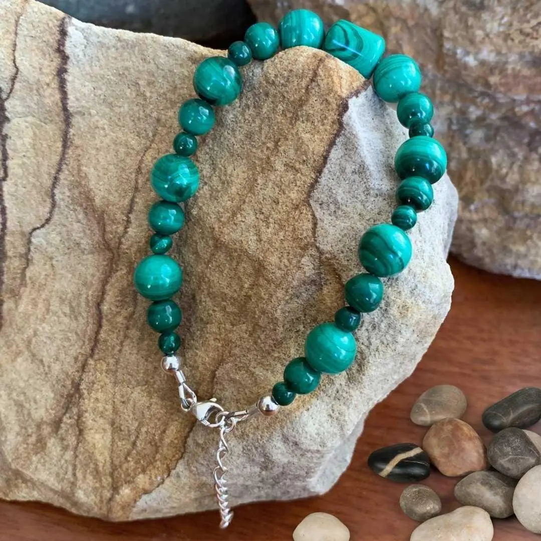 an image of a Assorted Round and Barrel Beaded Malachite Bracelet with sterling silver beads and lobster clasp on ends