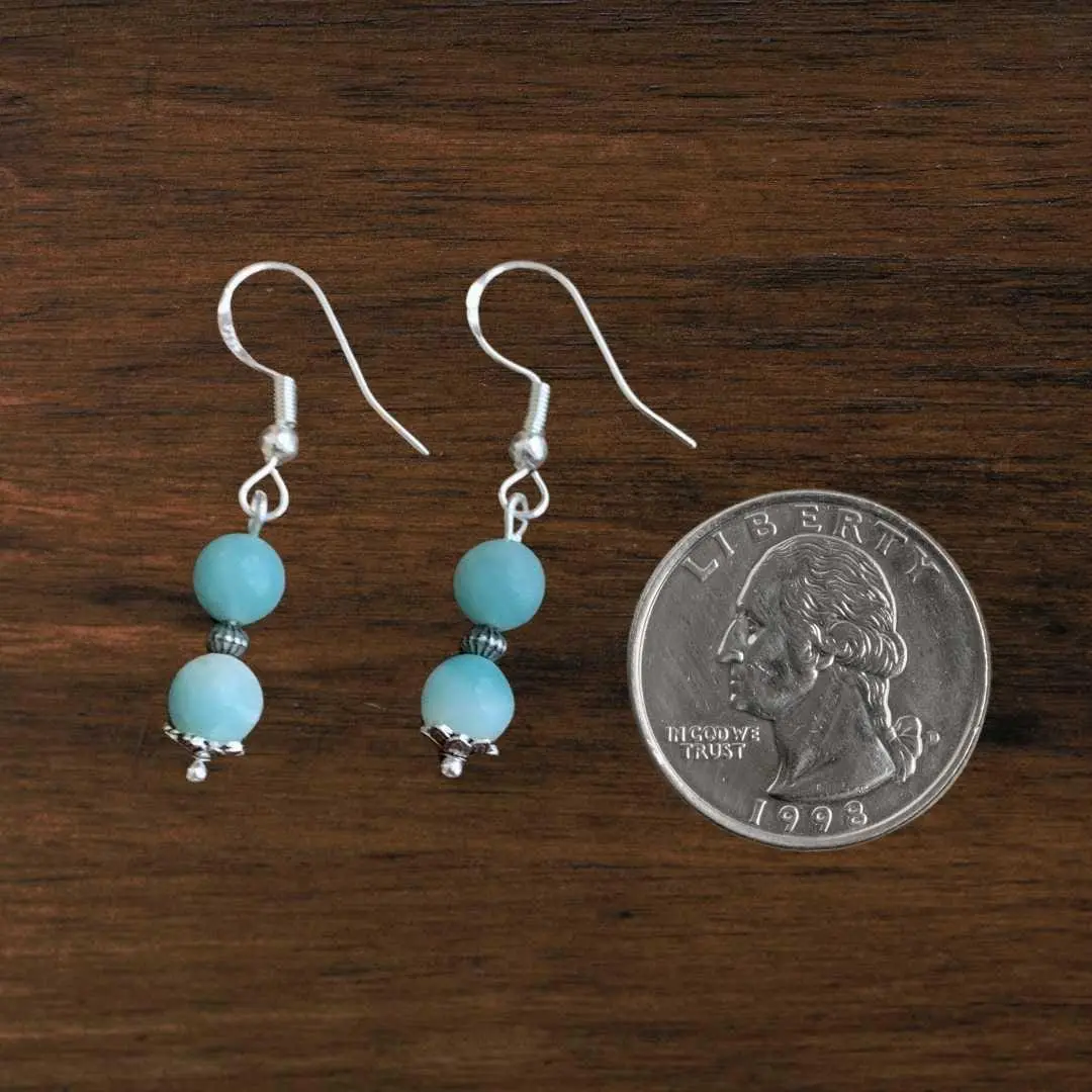 Double Amazonite and Sterling Lotus Cap Earrings. The Lotus Cap bead is on the under side of the bottom bead. The earrings are next to a quarter