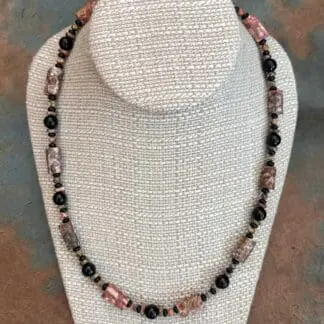 an image of a Leopard Skin Jasper Tubes and Black Onyx Necklace with a sterling silver lobster clasp