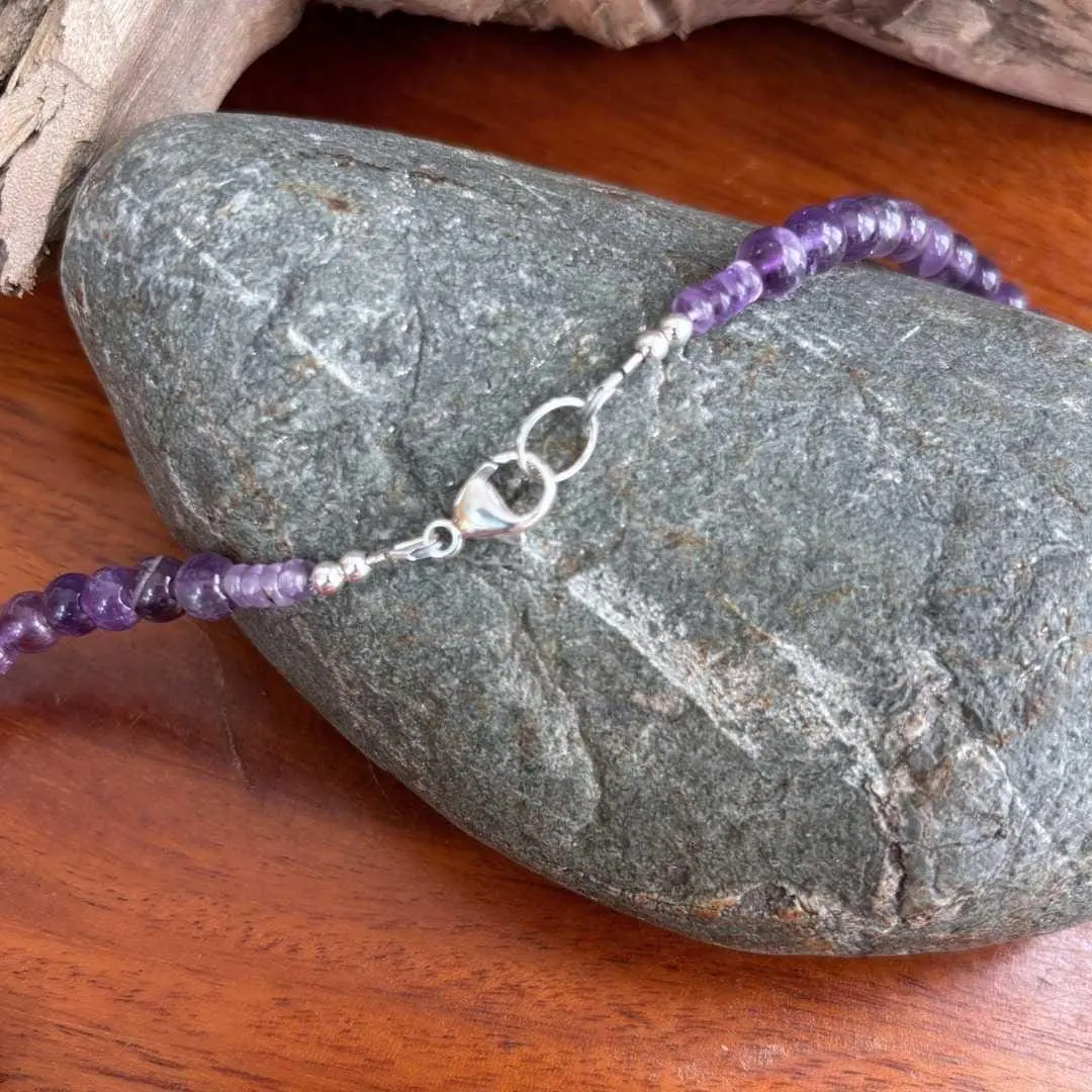 a view of the sterling silver clasp on a Rainbow Amethyst and Amethyst Necklace