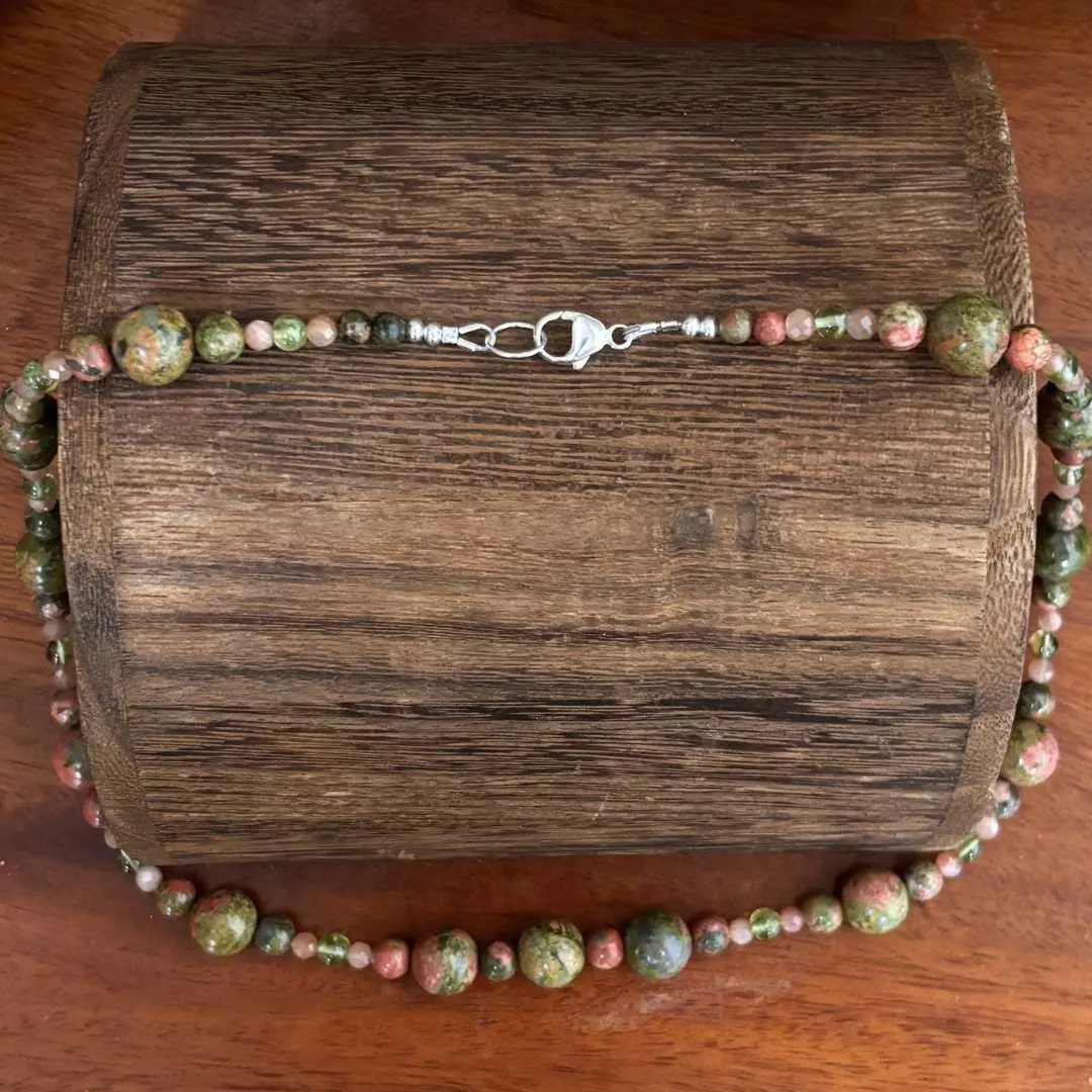 an image of the sterling silver lobster clasp of a Unakite with Peach Moonstone and Peridot Necklace